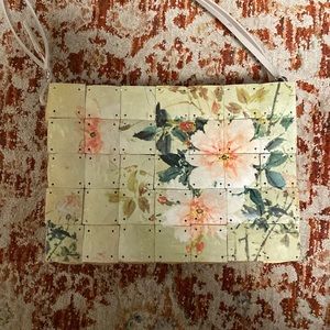 Handmade wooden bag with floral design